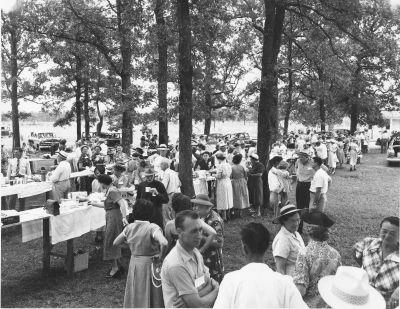 Homecoming picnic celebration in Dodge, Texas in 1956 courtesy of the Walker County Treasurers.