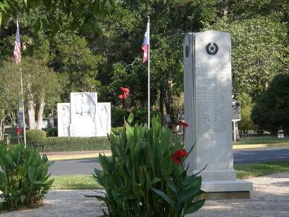 Sam Houston Memorial Grave in foreground and James Gillespie Monument at Oakwood Cemetery.