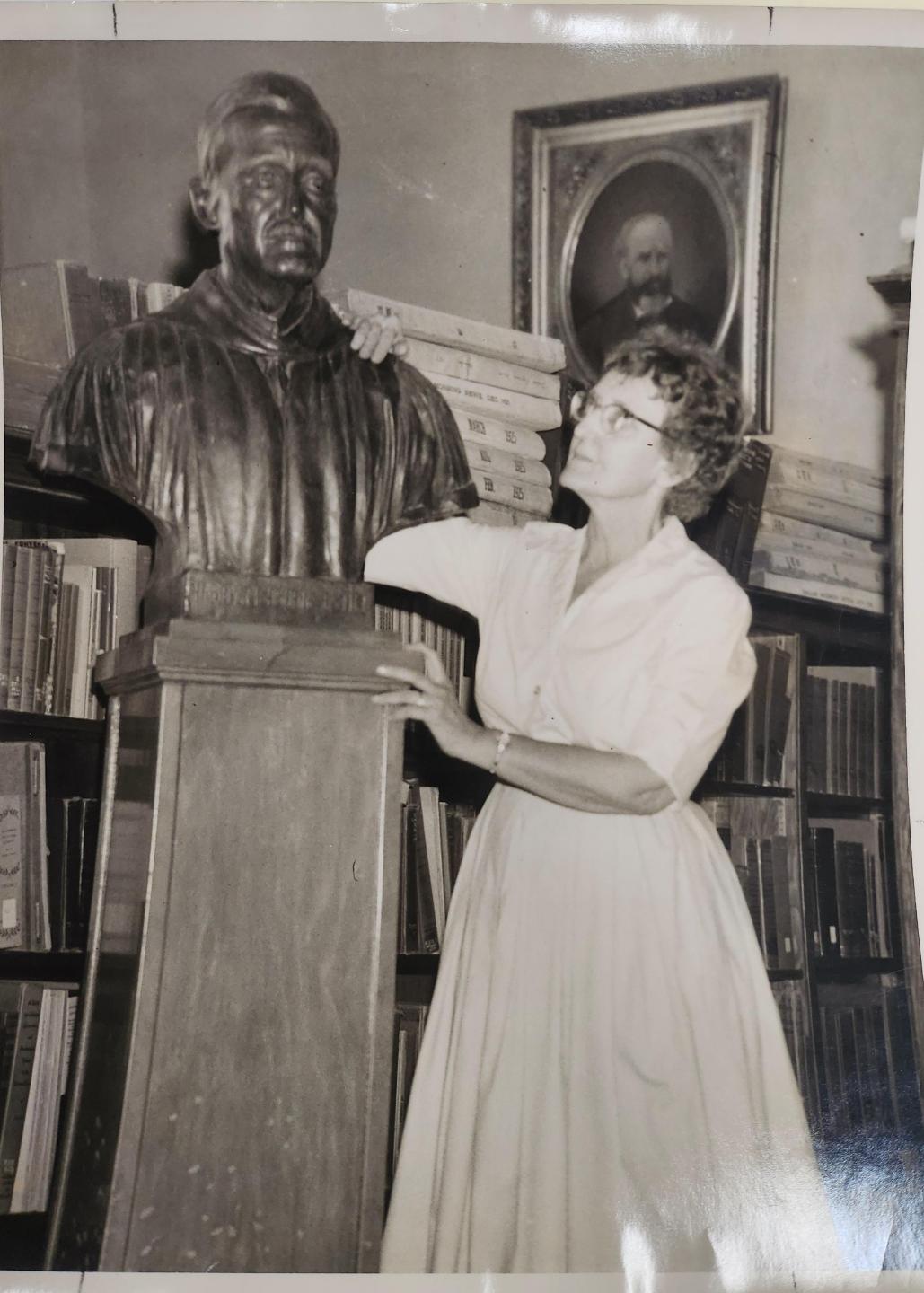 Mary Sexton Estill with bust of her father, Harry F. Estill.